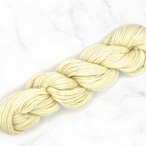 A skein of undyed shetland DK yarn